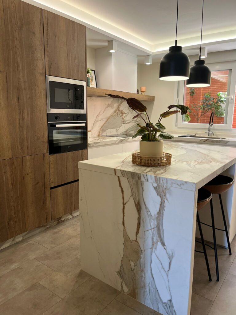 diseño de cocina con puerta corredera DK Cocina Integral Studio DK Grupo fabrica de muebles interiorismo